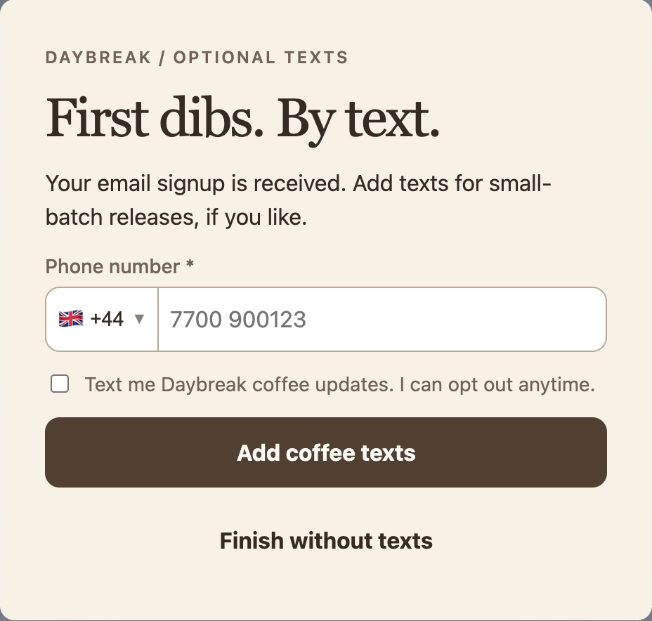 Real Daybreak optional SMS form: First dibs. By text., UK phone field, unchecked coffee-updates permission, Add coffee texts and Finish without texts.